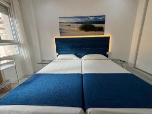 Posteľ alebo postele v izbe v ubytovaní Apartamentos Turisticos Imar