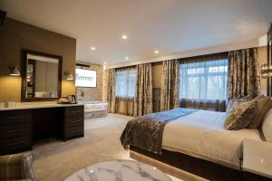 Katil atau katil-katil dalam bilik di Bushtown Hotel & Spa