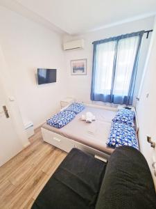 Ένα ή περισσότερα κρεβάτια σε δωμάτιο στο Croparadise Hostel
