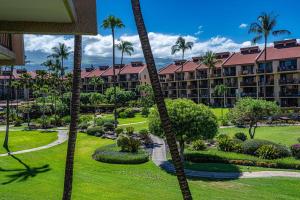 an aerial view of a resort with palm trees at Kamaole Sands 1-305 in Wailea