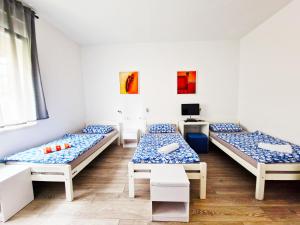 Ένα ή περισσότερα κρεβάτια σε δωμάτιο στο Croparadise Hostel