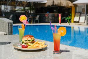 Bazén v ubytování Moni Hotel nebo v jeho okolí