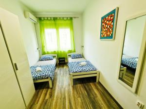 Ένα ή περισσότερα κρεβάτια σε δωμάτιο στο Croparadise Hostel