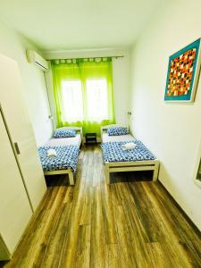 Ένα ή περισσότερα κρεβάτια σε δωμάτιο στο Croparadise Hostel