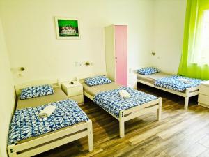 Ένα ή περισσότερα κρεβάτια σε δωμάτιο στο Croparadise Hostel