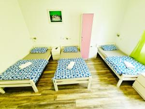 Ένα ή περισσότερα κρεβάτια σε δωμάτιο στο Croparadise Hostel