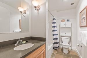 a bathroom with a sink and a toilet at Stillwater 3005 by Moose Management in Heber City