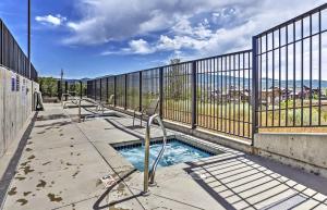 a small swimming pool next to a fence at Stillwater 3005 by Moose Management in Heber City