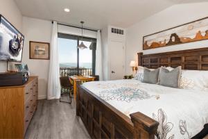 Ένα ή περισσότερα κρεβάτια σε δωμάτιο στο Stillwater 3070 by Moose Management +68 φωτογραφίες