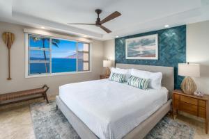 En eller flere senge i et værelse på Royal Mauian 614 + 41 billeder