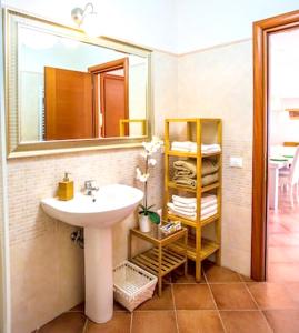 a bathroom with a sink and a mirror at Studio with wifi at La Massimina Casal Lumbroso in La Massimina-Casal Lumbroso