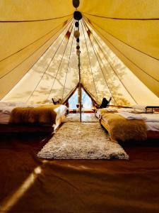 Postel nebo postele na pokoji v ubytování Berchez Glamping