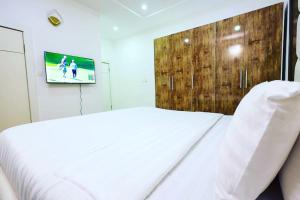 Voodi või voodid majutusasutuse Exclusive 3-Bed Apartment in Lagos toas +2 fotot