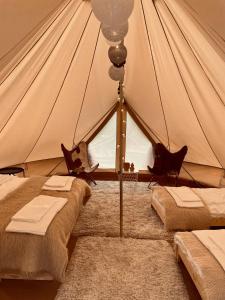 Postel nebo postele na pokoji v ubytování Berchez Glamping