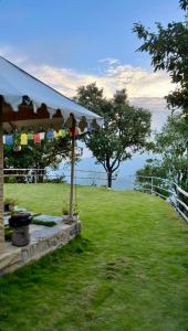 A garden outside DugDug Camps - Glamping Amidst Nature