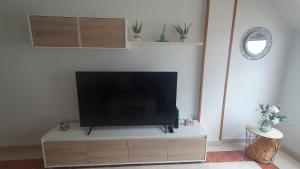 TV a/nebo společenská místnost v ubytování Miramar