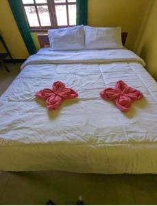 Postel nebo postele na pokoji v ubytování Mushtinal Guest House
