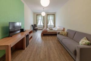 TV a/nebo společenská místnost v ubytování Hotel Anno