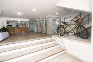 a bike parked on the wall in a lobby at Hotel Stil Cartagena in Cartagena de Indias