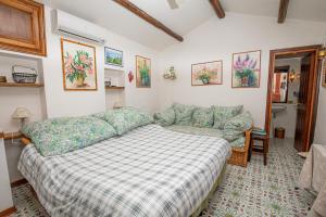 Posteľ alebo postele v izbe v ubytovaní Il Cottage di Villa Sveva, splendida vista mare