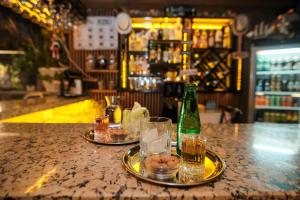 Nápoje v ubytování Moni Hotel