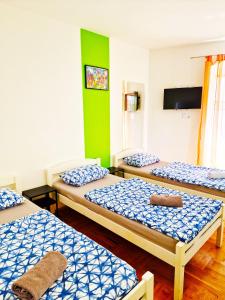 Ένα ή περισσότερα κρεβάτια σε δωμάτιο στο Croparadise Hostel