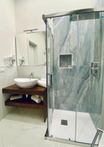 Koupelna v ubytování B&B Hèlios