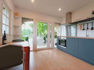 Dapur atau dapur kecil di Gite lumineux avec jardin, terrasse et vue