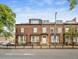 a brick building on the side of a street at 1 Bed in Carlisle 92869 in Carlisle