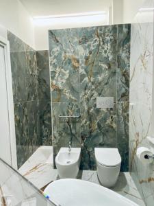 Koupelna v ubytování B&B Hèlios