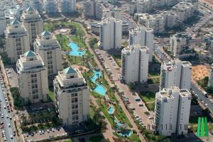 an aerial view of a city with tall buildings at מיני דירת פנטהאוז in Rishon LeẔiyyon