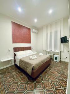 Postel nebo postele na pokoji v ubytování B&B Hèlios