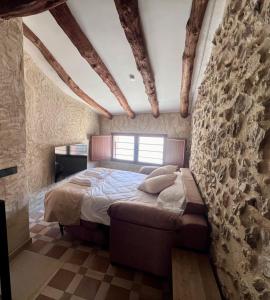 Postel nebo postele na pokoji v ubytování Casa Raquel Montanejos + 35 fotografií