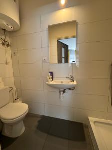 Um banheiro em Apartamenty Stary Rynek 18