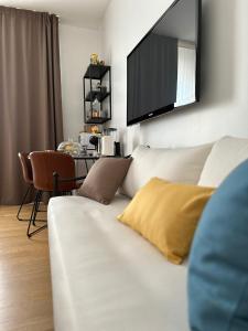 TV a/nebo společenská místnost v ubytování B&B L'ULIVO