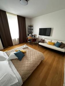 Postel nebo postele na pokoji v ubytování B&B L'ULIVO