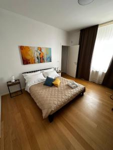 Postel nebo postele na pokoji v ubytování B&B L'ULIVO