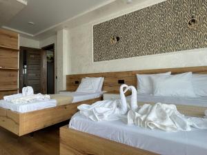 Letto o letti in una camera di Hotel Sunlight