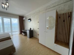 TV o dispositivi per l'intrattenimento presso Hotel Sunlight