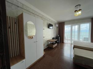 TV o dispositivi per l'intrattenimento presso Hotel Sunlight