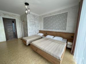 Letto o letti in una camera di Hotel Sunlight