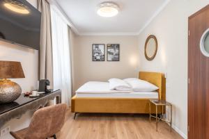 Voodi või voodid majutusasutuse PAPPAS hotel&studio toas