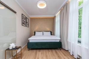 Voodi või voodid majutusasutuse PAPPAS hotel&studio toas