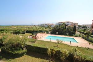Bazén v ubytovaní TRO91 - Studio cabine vue mer dans une residence avec piscine alebo v jeho blízkosti
