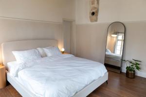 Postel nebo postele na pokoji v ubytování Mila - Boutique Hotel