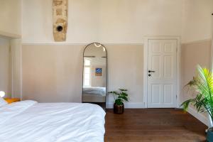 Postel nebo postele na pokoji v ubytování Mila - Boutique Hotel