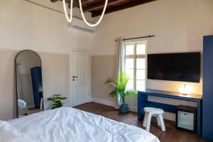 Postel nebo postele na pokoji v ubytování Mila - Boutique Hotel