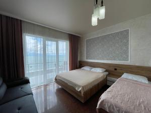 Letto o letti in una camera di Hotel Sunlight