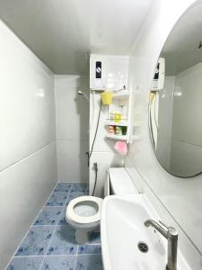 Ein Badezimmer in der Unterkunft impact Condo C3 Milo