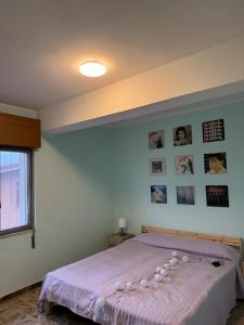 Postel nebo postele na pokoji v ubytování B&B il riccio